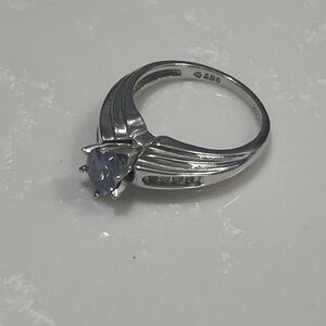 Elegant Silver Ring with Purple Gemstone